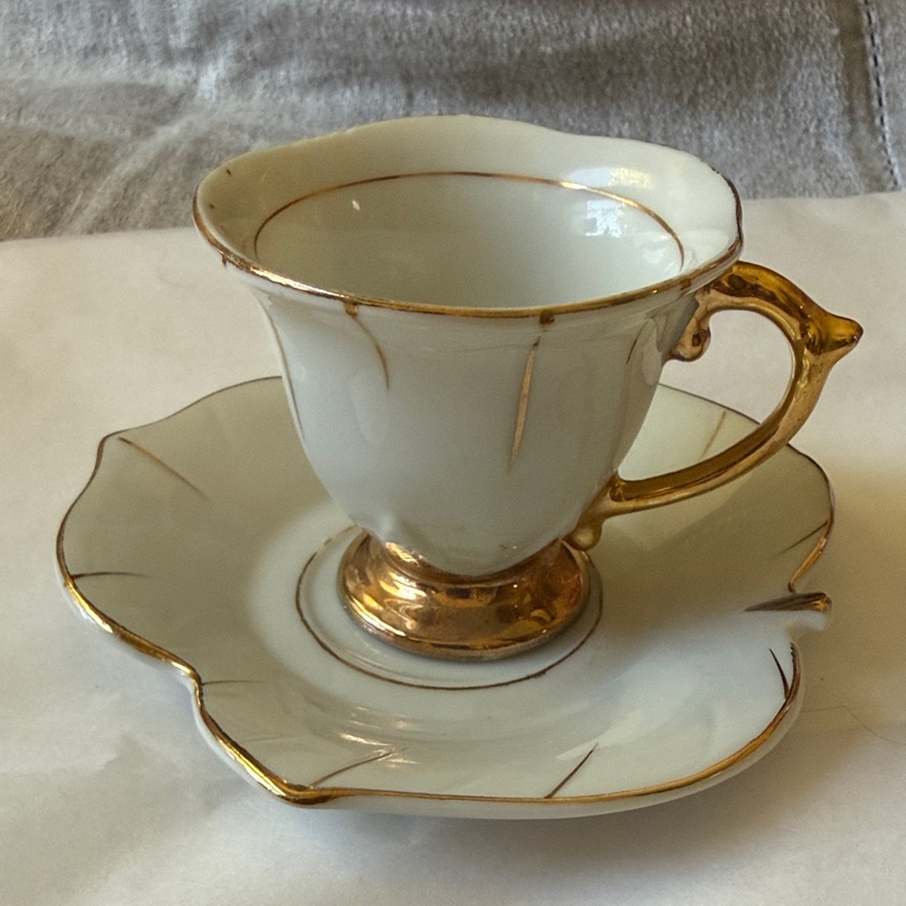 Vintage porcelain white & gold floral & leaf design demitasse cup & saucer set
